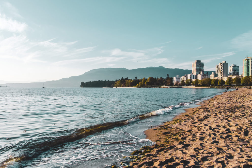 Visiting English Bay Beach makes summer one of the best times to visit Vancouver.